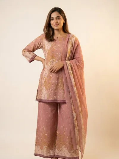 The same fabric stitched as a short kurti with wide-leg palazzo trousers.