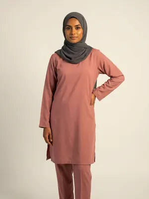 House model: Pakistani woman in her mid-twenties wearing a charcoal hijab, petite frame.